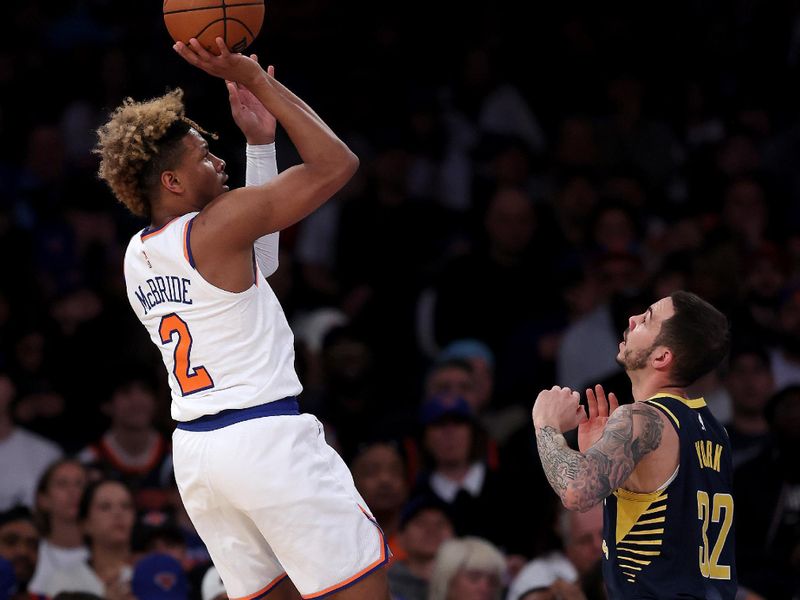 NEW YORK, NEW YORK - APRIL 09:  Miles McBride #2 of the New York Knicks shoots a three point shot as Gabe York #32 of the Indiana Pacers defends in the first half at Madison Square Garden on April 09, 2023 in New York City. NOTE TO USER: User expressly acknowledges and agrees that, by downloading and or using this photograph, User is consenting to the terms and conditions of the Getty Images License Agreement. (Photo by Elsa/Getty Images)