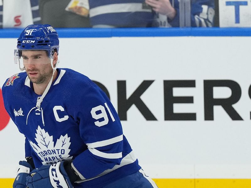 Dec 19, 2023; Toronto, Ontario, CAN; Toronto Maple Leafs center John Tavares (91) skates during the warmup against the New York Rangers at Scotiabank Arena. Mandatory Credit: Nick Turchiaro-USA TODAY Sports