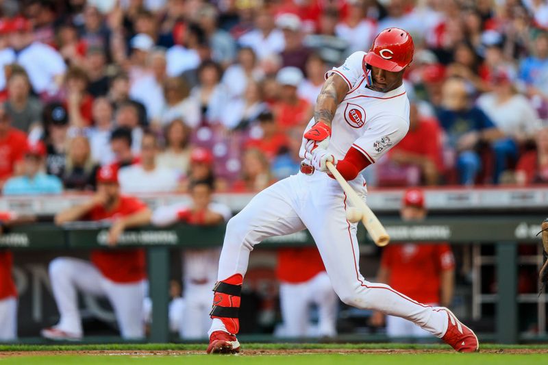 May 21, 2024; Cincinnati, Ohio, USA; Cincinnati Reds outfielder Will Benson (30) hits a single against the San Diego Padres in the second inning at Great American Ball Park. Mandatory Credit: Katie Stratman-USA TODAY Sports