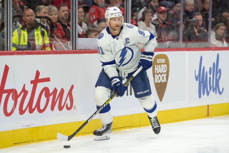 Nov 4, 2023; Ottawa, Ontario, CAN; Tampa Bay Lightning center Steven Stamkos (91) skates with the puck in the second period against the Ottawa Senators at the Canadian Tire Centre. Mandatory Credit: Marc DesRosiers-USA TODAY Sports