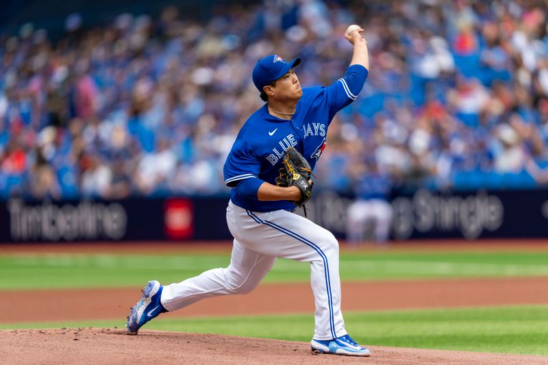 Aug 13, 2023; Toronto, Ontario, CAN; Toronto Blue Jays starting pitcher Hyun Jin Ryu (99) pitches to the Chicago Cubs during the first inning at Rogers Centre. Mandatory Credit: Kevin Sousa-USA TODAY Sports