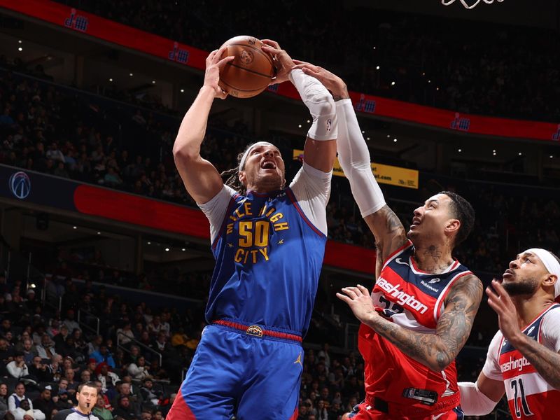 WASHINGTON, DC -? JANUARY 21:  Aaron Gordon #50 of the Denver Nuggets goes to the basket during the game on January 21, 2024 at Capital One Arena in Washington, DC. NOTE TO USER: User expressly acknowledges and agrees that, by downloading and or using this Photograph, user is consenting to the terms and conditions of the Getty Images License Agreement. Mandatory Copyright Notice: Copyright 2024 NBAE (Photo by Stephen Gosling/NBAE via Getty Images)