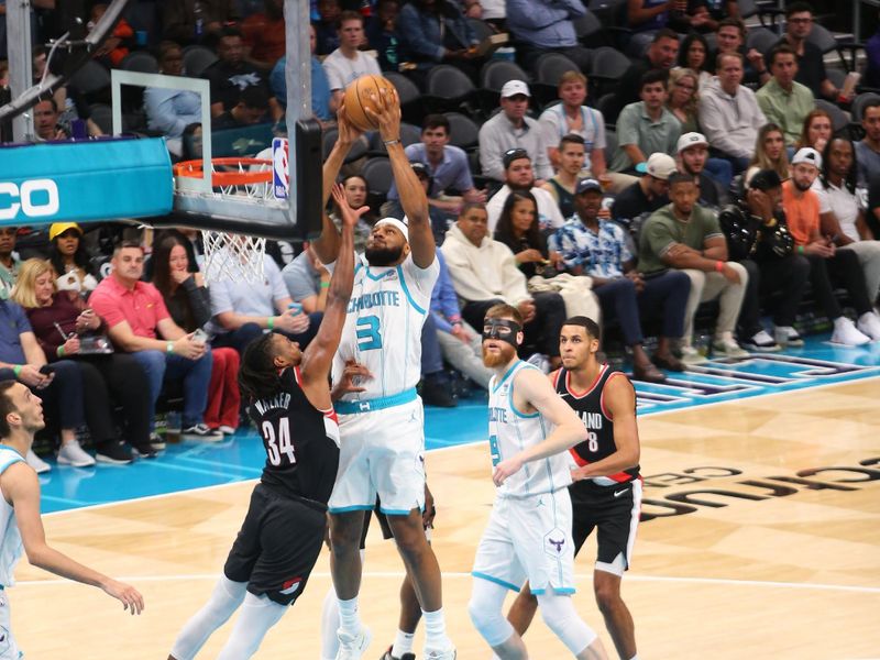 CHARLOTTE, NC - APRIL 3: Marques Bolden #3 of the Charlotte Hornets goes to the basket during the game on April 3, 2024 at Spectrum Center in Charlotte, North Carolina. NOTE TO USER: User expressly acknowledges and agrees that, by downloading and or using this photograph, User is consenting to the terms and conditions of the Getty Images License Agreement. Mandatory Copyright Notice: Copyright 2024 NBAE (Photo by Kent Smith/NBAE via Getty Images)