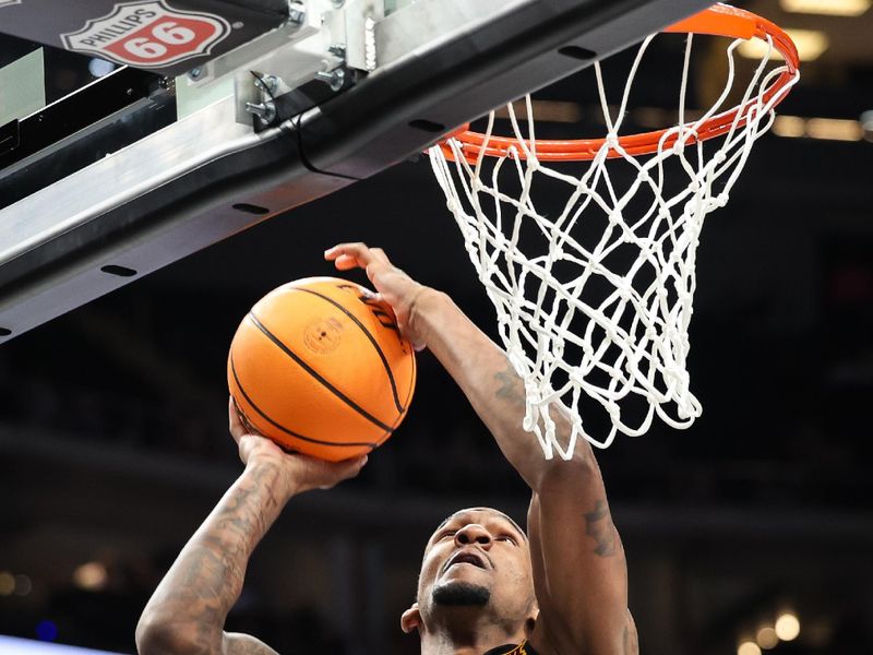 Mar 11, 2025; Kansas City, MO, USA; Arizona State Sun Devils center Shawn Phillips Jr. (9) shoots the ball during the second half against the Kansas State Wildcats at T-Mobile Center. Mandatory Credit: William Purnell-Imagn Images