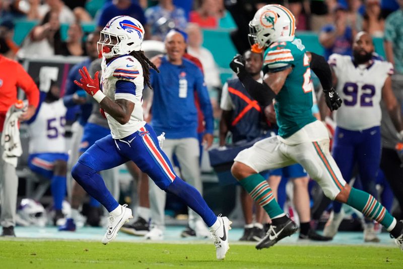 Buffalo Bills running back James Cook (4) runs for a touchdown during the first half of an NFL football game against the Miami Dolphins, Thursday, Sept. 12, 2024, in Miami Gardens, Fla. (AP Photo/Rebecca Blackwell)