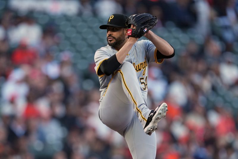 Apr 27, 2024; San Francisco, California, USA; Pittsburgh Pirates pitcher Martin Perez (54) throws a pitch against the San Francisco Giants during the first inning at Oracle Park. Mandatory Credit: Darren Yamashita-USA TODAY Sports