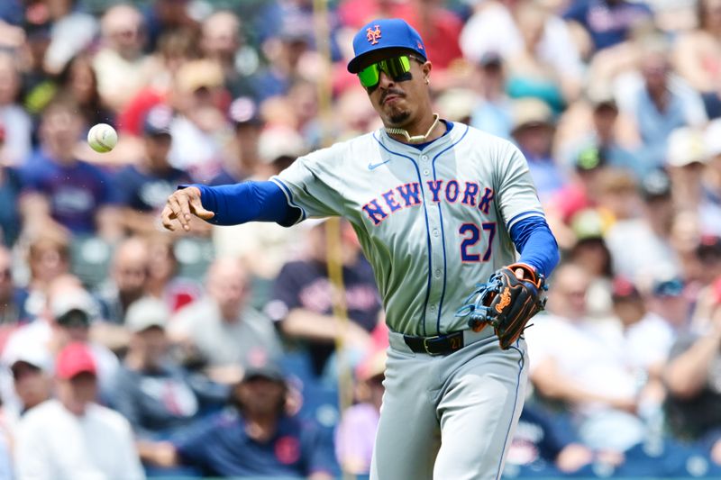 May 22, 2024; Cleveland, Ohio, USA; New York Mets third baseman Mark Vientos (27) throw out Cleveland Guardians center fielder Tyler Freeman (not pictured) during the first inning at Progressive Field. Mandatory Credit: Ken Blaze-USA TODAY Sports
