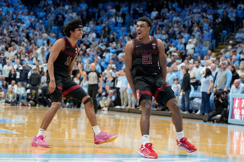 Jan 18, 2025; Chapel Hill, North Carolina, USA; Stanford Cardinal guard Jaylen Blakes (21) reacts with guard Ryan Agarwal (11) after hitting the game winning shot in the second half at Dean E. Smith Center. Mandatory Credit: Bob Donnan-Imagn Images