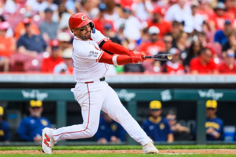 Jun 4, 2025; Cincinnati, Ohio, USA; Cincinnati Reds catcher Jose Trevino (35) hits a double in the third inning against the Milwaukee Brewers at Great American Ball Park. Mandatory Credit: Katie Stratman-Imagn Images
