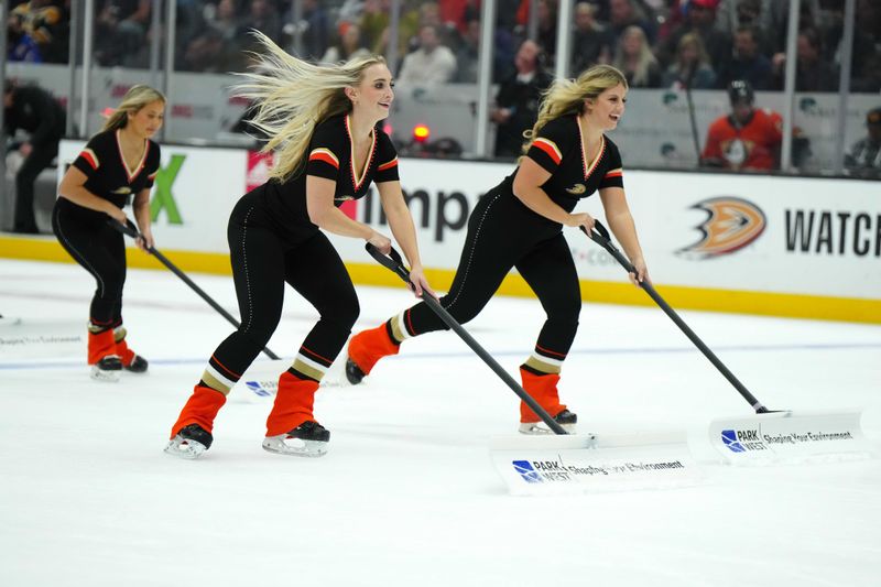 Nov 23, 2022; Anaheim, California, USA; Anaheim Ducks power player ice crew members clear the ice against the New York Rangers in the second period at Honda Center. Mandatory Credit: Kirby Lee-USA TODAY Sports