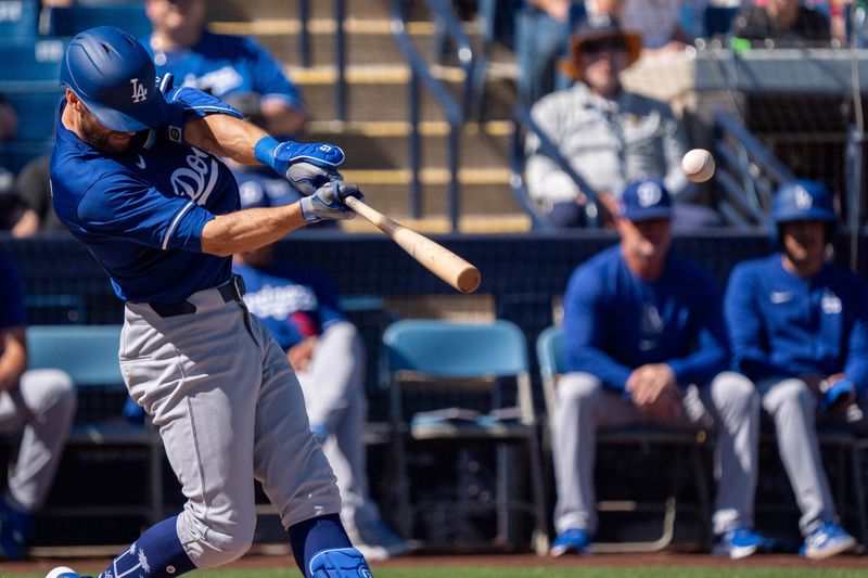 Mar 2, 2024; Phoenix, Arizona, USA; Los Angeles Dodgers infielder Chris Taylor (3) doubles in the first during a spring training game against the Milwaukee Brewers at American Family Fields of Phoenix. Mandatory Credit: Allan Henry-USA TODAY Sports