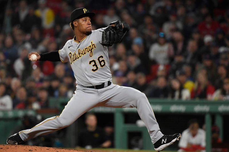 Apr 4, 2023; Boston, Massachusetts, USA;  Pittsburgh Pirates relief pitcher Dauri Moreta (36) pitches during the sixth inning against the Boston Red Sox at Fenway Park. Mandatory Credit: Bob DeChiara-USA TODAY Sports