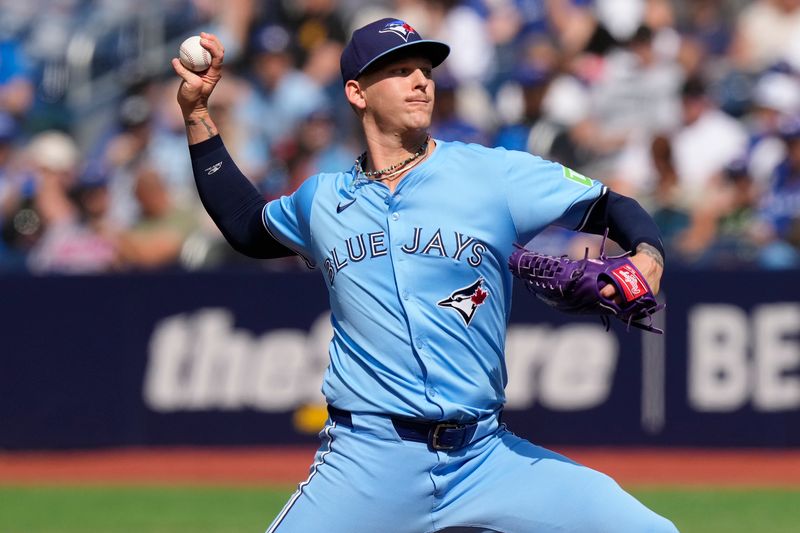 Aug 24, 2024; Toronto, Ontario, CAN; Toronto Blue Jays starting pitcher Bowden Francis (44) pitches to the Los Angeles Angels during the  second inning at Rogers Centre. Mandatory Credit: John E. Sokolowski-USA TODAY Sports