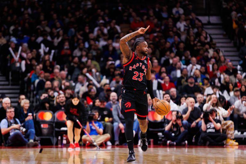 TORONTO, CANADA - JANUARY 3: Jamal Shead #23 of the Toronto Raptors dribbles the ball upcourt against the Orlando Magic during second half of their NBA game at Scotiabank Arena on January 3, 2025 in Toronto, Canada. NOTE TO USER: User expressly acknowledges and agrees that, by downloading and or using this photograph, User is consenting to the terms and conditions of the Getty Images License Agreement. (Photo by Cole Burston/Getty Images)