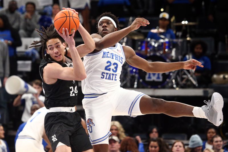 Jan 31, 2024; Memphis, Tennessee, USA; Rice Owls forward Keanu Dawes (24) catches a pass as Memphis Tigers forward Malcolm Dandridge (23) defends during the first half at FedExForum. Mandatory Credit: Petre Thomas-USA TODAY Sports