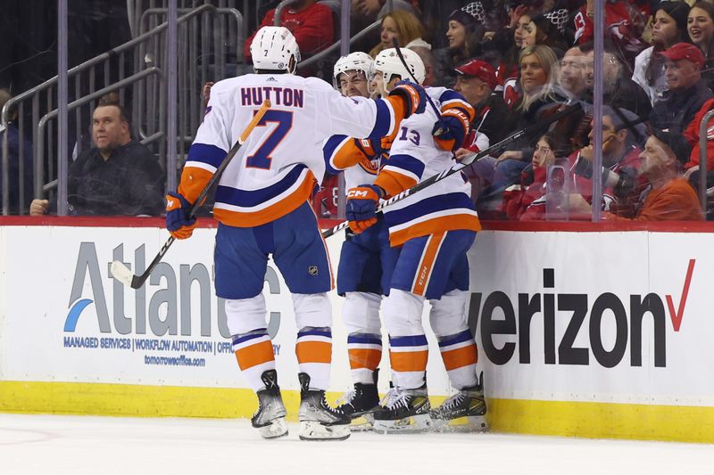 Nov 28, 2023; Newark, New Jersey, USA; New York Islanders center Jean-Gabriel Pageau (44) celebrates his goal against the New Jersey Devils during the second period at Prudential Center. Mandatory Credit: Ed Mulholland-USA TODAY Sports