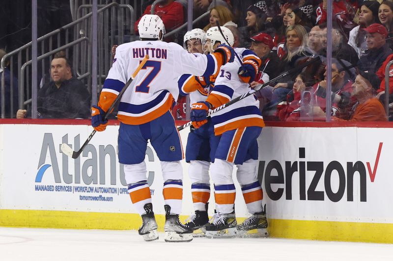 Nov 28, 2023; Newark, New Jersey, USA; New York Islanders center Jean-Gabriel Pageau (44) celebrates his goal against the New Jersey Devils during the second period at Prudential Center. Mandatory Credit: Ed Mulholland-USA TODAY Sports