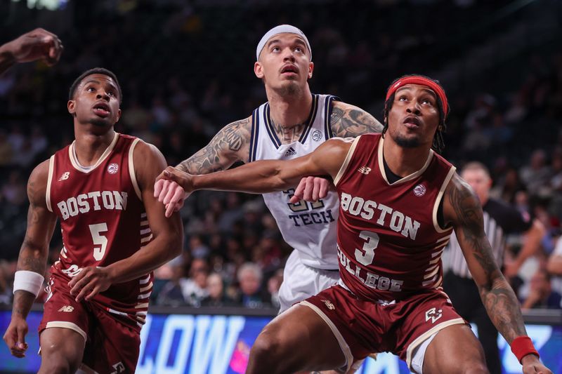 Jan 4, 2025; Atlanta, Georgia, USA; Boston College Eagles guard Fred Payne (5) and guard Roger McFarlane (3) box out Georgia Tech Yellow Jackets forward Duncan Powell (31) in the second half at McCamish Pavilion. Mandatory Credit: Brett Davis-Imagn Images