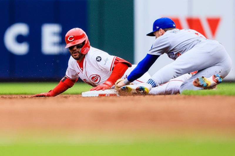 May 25, 2025; Cincinnati, Ohio, USA; Cincinnati Reds catcher Jose Trevino (35) slides into second after hitting a RBI double in the fifth inning against the Chicago Cubs at Great American Ball Park. Mandatory Credit: Katie Stratman-Imagn Images