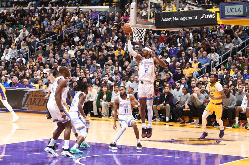 LOS ANGELES, CA - MARCH 4: Shai Gilgeous-Alexander #2 of the Oklahoma City Thunder rebounds the ball during the game against the Los Angeles Lakers on March 4, 2024 at Crypto.Com Arena in Los Angeles, California. NOTE TO USER: User expressly acknowledges and agrees that, by downloading and/or using this Photograph, user is consenting to the terms and conditions of the Getty Images License Agreement. Mandatory Copyright Notice: Copyright 2024 NBAE (Photo by Andrew D. Bernstein/NBAE via Getty Images)