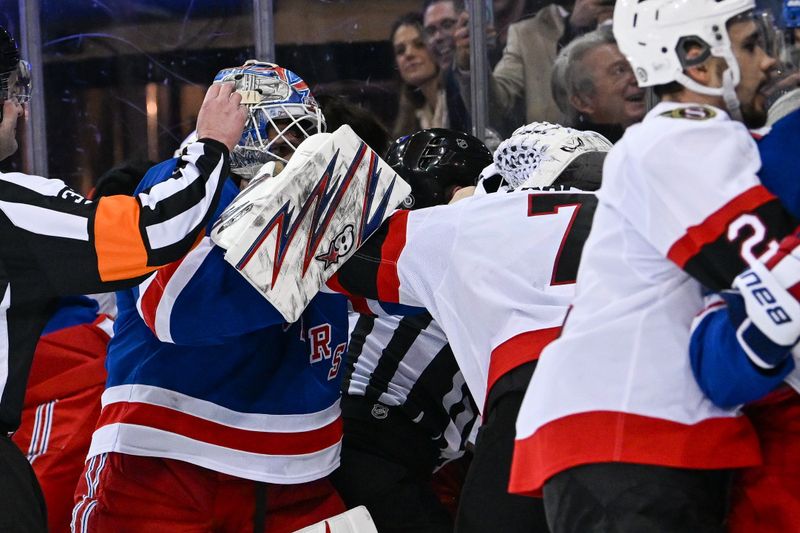 Jan 21, 2025; New York, New York, USA;  New York Rangers goaltender Igor Shesterkin (31) fights with Ottawa Senators left wing Brady Tkachuk (7) during the third period at Madison Square Garden. Mandatory Credit: Dennis Schneidler-Imagn Images