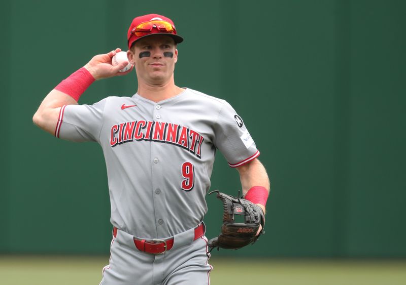 May 21, 2025; Pittsburgh, Pennsylvania, USA;  Cincinnati Reds second baseman Matt McLain (9) warms up against the Pittsburgh Pirates at PNC Park. Mandatory Credit: Charles LeClaire-Imagn Images