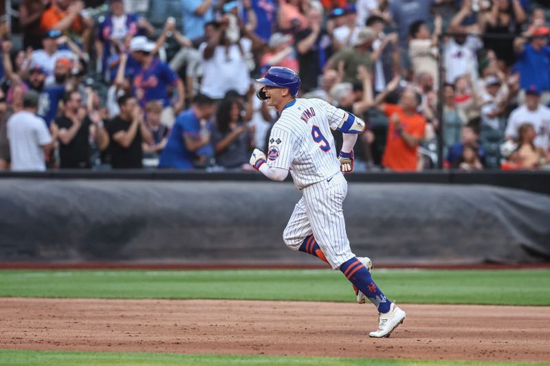 Jul 9, 2024; New York City, New York, USA;  New York Mets left fielder Brandon Nimmo (9) circles the bases after hitting a three run home run in the second inning against the Washington Nationals at Citi Field. Mandatory Credit: Wendell Cruz-USA TODAY Sports