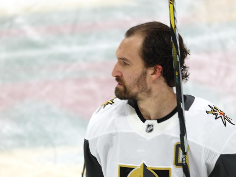 Apr 26, 2025; Saint Paul, Minnesota, USA; Vegas Golden Knights right wing Mark Stone (61) watches the play prior to the start of game four of the first round of the 2025 Stanley Cup Playoffs at Xcel Energy Center. Mandatory Credit: Bruce Fedyck-Imagn Images