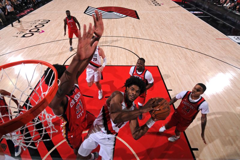 PORTLAND, OR - OCTOBER 27: Scoot Henderson #00 of the Portland Trail Blazers drives to the basket during the game against the New Orleans Pelicans on October 27, 2024 at the Moda Center Arena in Portland, Oregon. NOTE TO USER: User expressly acknowledges and agrees that, by downloading and or using this photograph, user is consenting to the terms and conditions of the Getty Images License Agreement. Mandatory Copyright Notice: Copyright 2024 NBAE (Photo by Cameron Browne/NBAE via Getty Images)