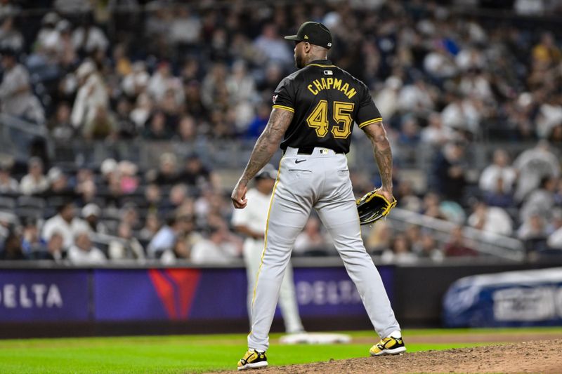 Sep 27, 2024; Bronx, New York, USA; Pittsburgh Pirates pitcher Aroldis Chapman (45) reacts after the games final out against the New York Yankees at Yankee Stadium. Mandatory Credit: John Jones-Imagn Images