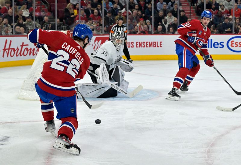 Dec 7, 2023; Montreal, Quebec, CAN; Montreal Canadiens forward Cole Caufield (22) takes a shot on Los Angeles Kings goalie Cam Talbot (39) during the second period at the Bell Centre. Mandatory Credit: Eric Bolte-USA TODAY Sports