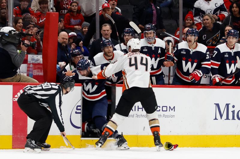 Jan 16, 2024; Washington, District of Columbia, USA; Anaheim Ducks left wing Ross Johnston (44) fights Washington Capitals defenseman Joel Edmundson (6) in the first period at Capital One Arena. Mandatory Credit: Geoff Burke-USA TODAY Sports