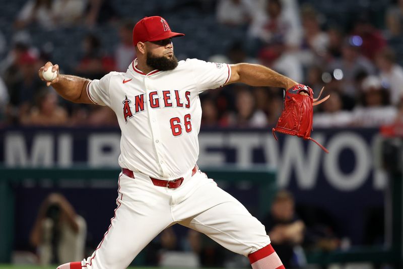 Jun 28, 2024; Anaheim, California, USA;  Los Angeles Angels relief pitcher Luis Garcia (66) pitches during the eighth inning against the Detroit Tigers at Angel Stadium. Mandatory Credit: Kiyoshi Mio-USA TODAY Sports