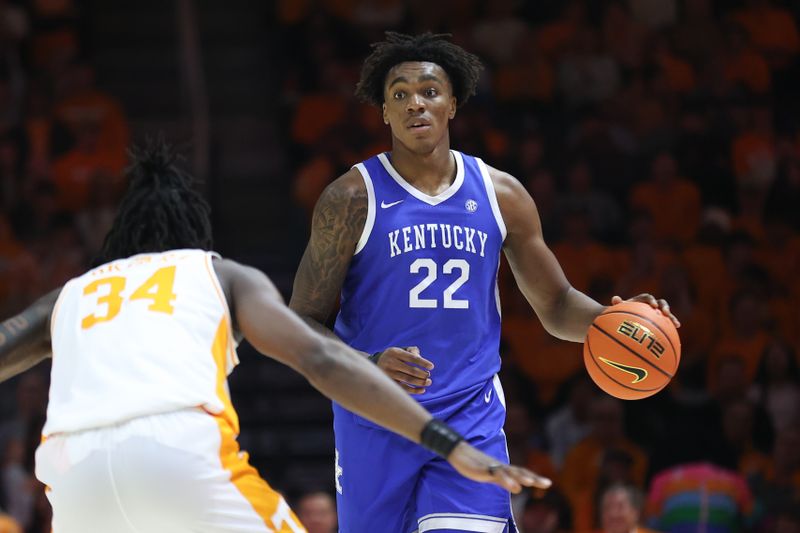 Jan 28, 2025; Knoxville, Tennessee, USA; Kentucky Wildcats center Amari Williams (22) brings the ball up court against Tennessee Volunteers forward Felix Okpara (34) during the second half at Thompson-Boling Arena at Food City Center. Mandatory Credit: Randy Sartin-Imagn Images