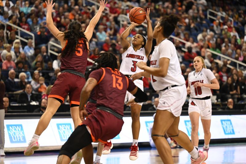 Mar 5, 2023; Greensboro, NC, USA; Louisville Cardinals guard Chrislyn Carr (3) shoots over Virginia Tech Hokies guard Georgia Amoore (5) during the first half at Greensboro Coliseum. Mandatory Credit: William Howard-USA TODAY Sports