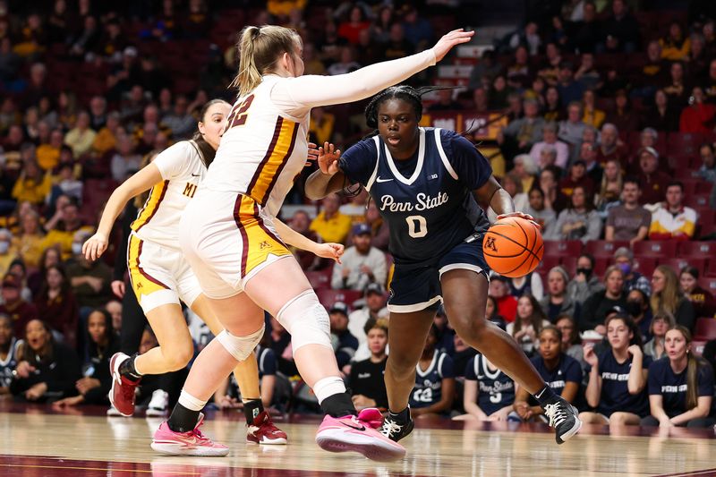 Jan 31, 2024; Minneapolis, Minnesota, USA; Penn State Nittany Lions guard Ashley Owusu (0) works around Minnesota Golden Gophers center Sophie Hart (52) during the second half at Williams Arena. Mandatory Credit: Matt Krohn-USA TODAY Sports