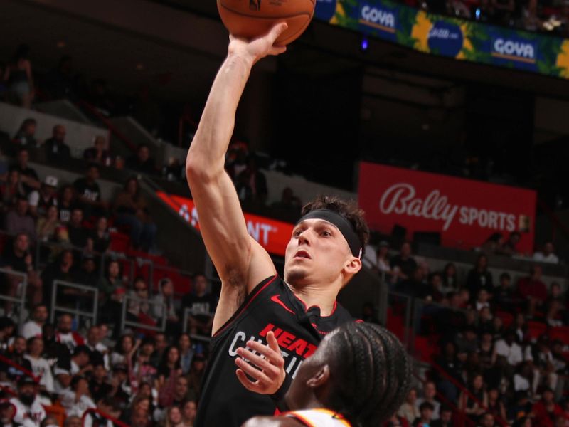 MIAMI, FL - JANUARY 19: Tyler Herro #14 of the Miami Heat shoots the ball during the game against the Atlanta Hawks on January 19, 2024 at Kaseya Center in Miami, Florida. NOTE TO USER: User expressly acknowledges and agrees that, by downloading and or using this Photograph, user is consenting to the terms and conditions of the Getty Images License Agreement. Mandatory Copyright Notice: Copyright 2024 NBAE (Photo by Issac Baldizon/NBAE via Getty Images)