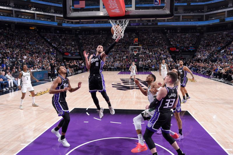 SACRAMENTO, CA - MARCH 22: Zach LaVine #8 of the Sacramento Kings grabs the rebound during the game against the Milwaukee Bucks on March 22, 2025 at Golden 1 Center in Sacramento, California. NOTE TO USER: User expressly acknowledges and agrees that, by downloading and or using this Photograph, user is consenting to the terms and conditions of the Getty Images License Agreement. Mandatory Copyright Notice: Copyright 2025 NBAE (Photo by Rocky Widner/NBAE via Getty Images)