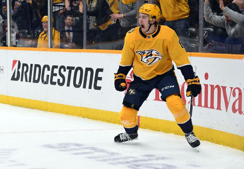 Jan 26, 2023; Nashville, Tennessee, USA; Nashville Predators center Cody Glass (8) celebrates after a goal during the first period against the New Jersey Devils at Bridgestone Arena. Mandatory Credit: Christopher Hanewinckel-USA TODAY Sports