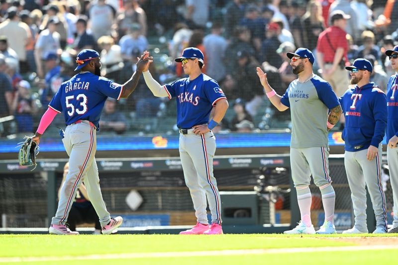 May 11, 2025; Detroit, Michigan, USA; Texas Rangers right fielder Adolis García (53) celebrates with outfielder Sam Haggerty (0) after defeating the Detroit Tigers at Comerica Park. Mandatory Credit: Lon Horwedel-Imagn Images