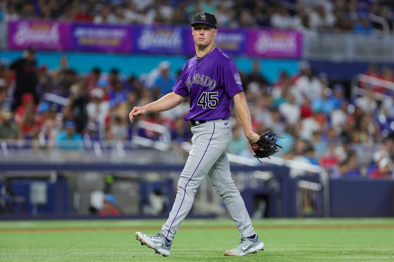 Jul 22, 2023; Miami, Florida, USA; Colorado Rockies starting pitcher Chase Anderson (45) looks on against the Miami Marlins during the fifth inning at loanDepot Park. Mandatory Credit: Sam Navarro-USA TODAY Sports