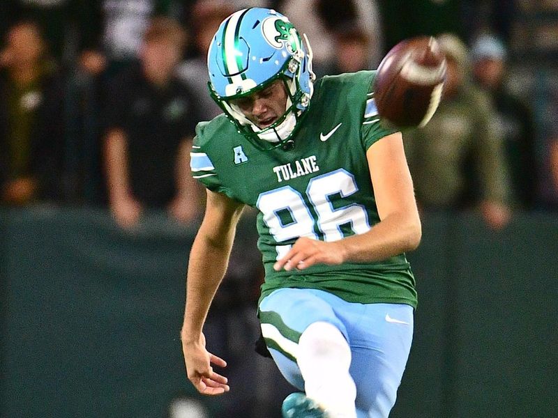 Nov 12, 2022; New Orleans, Louisiana, USA; Tulane Green Wave punter Casey Glover (96) kicks off against the UCF Knights during the fourth quarter at Yulman Stadium. Mandatory Credit: Rebecca Warren-USA TODAY Sports