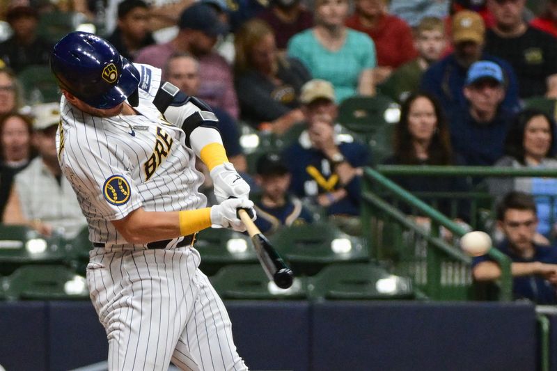 Sep 16, 2023; Milwaukee, Wisconsin, USA;  Milwaukee Brewers third baseman Josh Donaldson (3) drives in a run with a base hit in the fifth inning against the Washington Nationals at American Family Field. Mandatory Credit: Benny Sieu-USA TODAY Sports