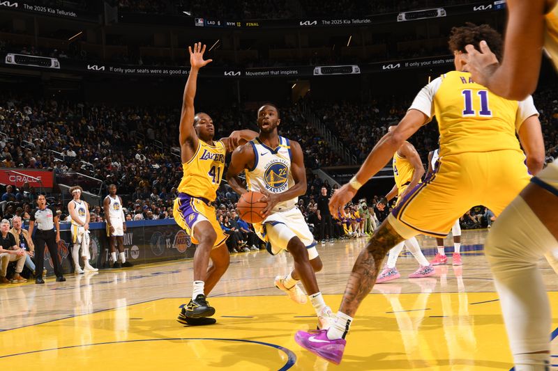 SAN FRANCISCO, CA - OCTOBER 18: Andrew Wiggins #22 of the Golden State Warriors drives to the basket during the game against the Los Angeles Lakers during a NBA Preseason game on October 18, 2024 at Chase Center in San Francisco, California. NOTE TO USER: User expressly acknowledges and agrees that, by downloading and or using this photograph, user is consenting to the terms and conditions of Getty Images License Agreement. Mandatory Copyright Notice: Copyright 2024 NBAE (Photo by Noah Graham/NBAE via Getty Images)