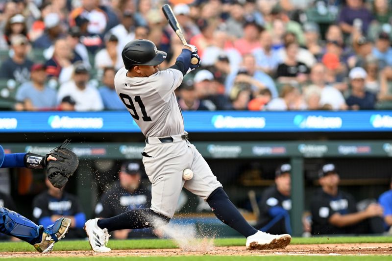 Aug 16, 2024; Detroit, Michigan, USA;  New York Yankees third baseman Oswald Peraza (91) hits a foul ball off his body against the Detroit Tigers in the second inning at Comerica Park. Mandatory Credit: Lon Horwedel-USA TODAY Sports