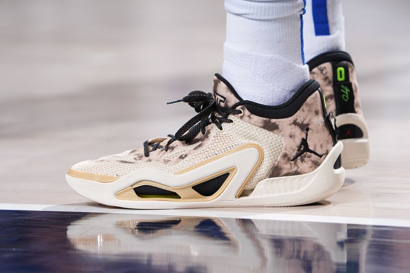 DALLAS, TX - MARCH 13: The sneakers worn by Tim Hardaway Jr. #10 of the Dallas Mavericks during the game against the Golden State Warriors on March 13, 2024 at the American Airlines Center in Dallas, Texas. NOTE TO USER: User expressly acknowledges and agrees that, by downloading and or using this photograph, User is consenting to the terms and conditions of the Getty Images License Agreement. Mandatory Copyright Notice: Copyright 2024 NBAE (Photo by Glenn James/NBAE via Getty Images)