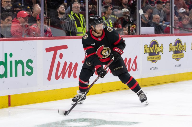 Oct 10, 2024; Ottawa, Ontario, CAN; Ottawa Senators defenseman Nick Jensen (3) skates with the puck in the second period against the Florida Panthers at the Canadian Tire Centre. Mandatory Credit: Marc DesRosiers-Imagn Images