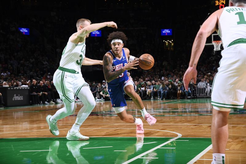 BOSTON, MA - OCTOBER 12: Lester Quinones #25 of the Philadelphia 76ers drives to the basket during the game against the Boston Celtics during a NBA Preseason game on October 12, 2024 at TD Garden in Boston, Massachusetts. NOTE TO USER: User expressly acknowledges and agrees that, by downloading and/or using this Photograph, user is consenting to the terms and conditions of the Getty Images License Agreement. Mandatory Copyright Notice: Copyright 2024 NBAE (Photo by Brian Babineau/NBAE via Getty Images)