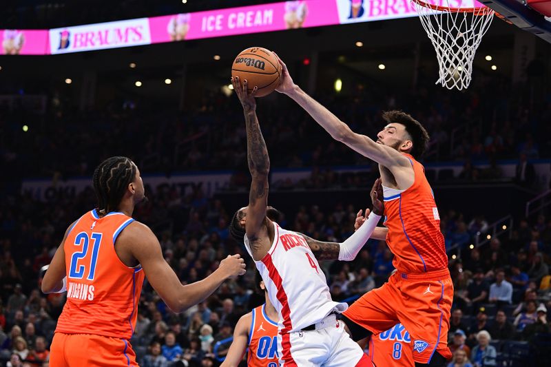 OKLAHOMA CITY, OKLAHOMA - NOVEMBER 8: Chet Holmgren #7 of the Oklahoma City Thunder blocks the shot of Jalen Green #4 of the Houston Rockets during the first half at Paycom Center on November 8, 2024 in Oklahoma City, Oklahoma. NOTE TO USER: User expressly acknowledges and agrees that, by downloading and or using this photograph, User is consenting to the terms and conditions of the Getty Images License Agreement. (Photo by Joshua Gateley/Getty Images)