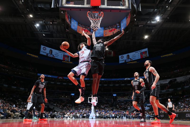 WASHINGTON, DC -? FEBRUARY 24: Kyshawn George #18 of the Washington Wizards drives to the basket during the game against the Brooklyn Nets on February 24, 2025 at Capital One Arena in Washington, DC. NOTE TO USER: User expressly acknowledges and agrees that, by downloading and or using this Photograph, user is consenting to the terms and conditions of the Getty Images License Agreement. Mandatory Copyright Notice: Copyright 2025 NBAE (Photo by Stephen Gosling/NBAE via Getty Images)